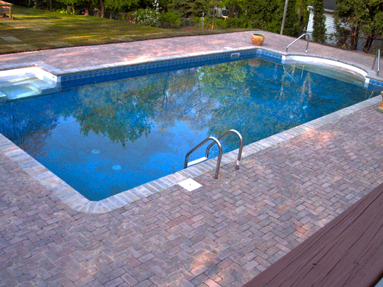Poolscape Using Antique / Tumbled Finish Concrete Pavers